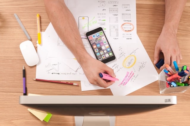 person planning on a desk